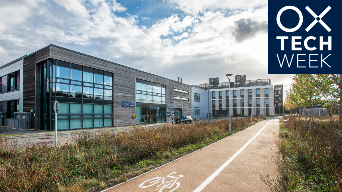 A cycle path next to two office buildings at Begbroke Science Park